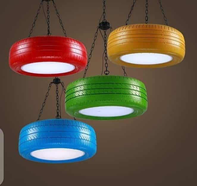 Nigerian Female artist Alice Obodom turns used car tyres into stylish things - See Beautiful Photos 4